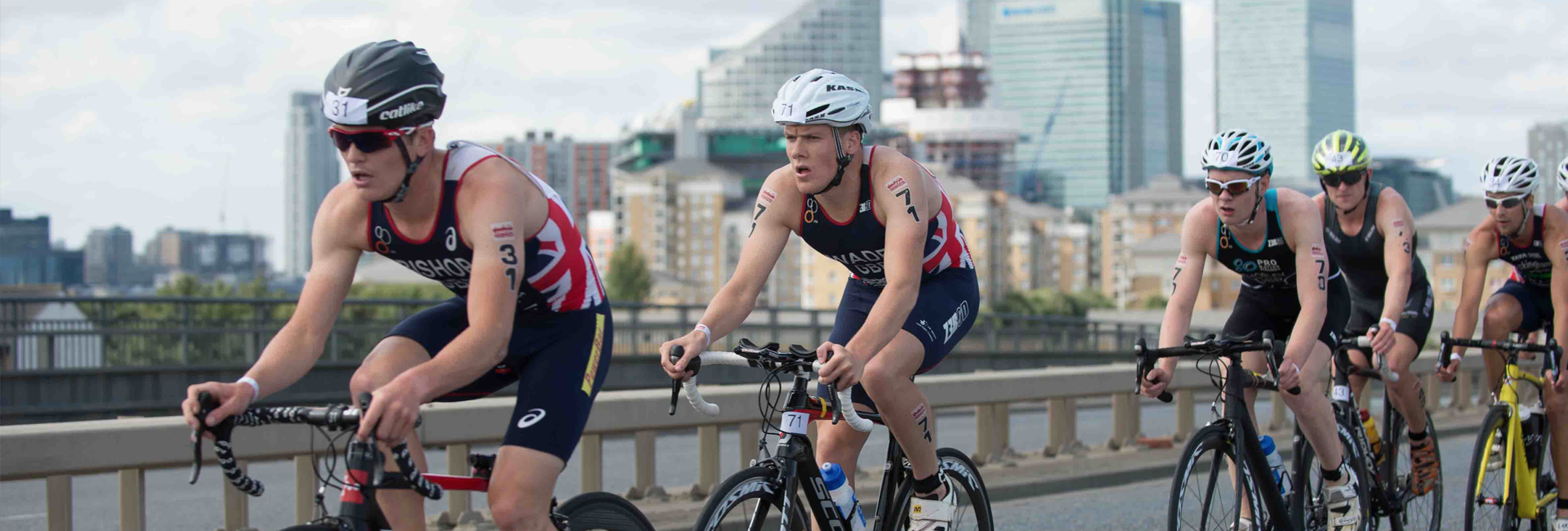 Group of athlete cyclists taking part in a triathlon race