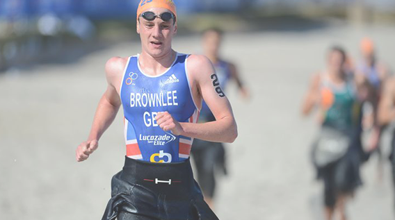 Athlete swimmer running in part of a triathlon race