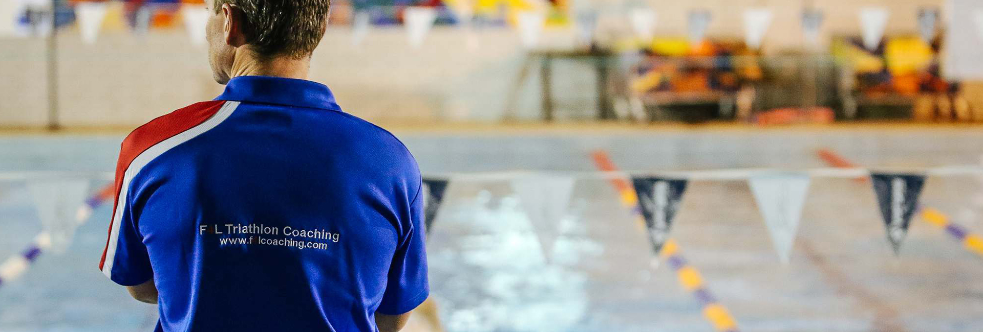 Sports Scientist observing swimmers