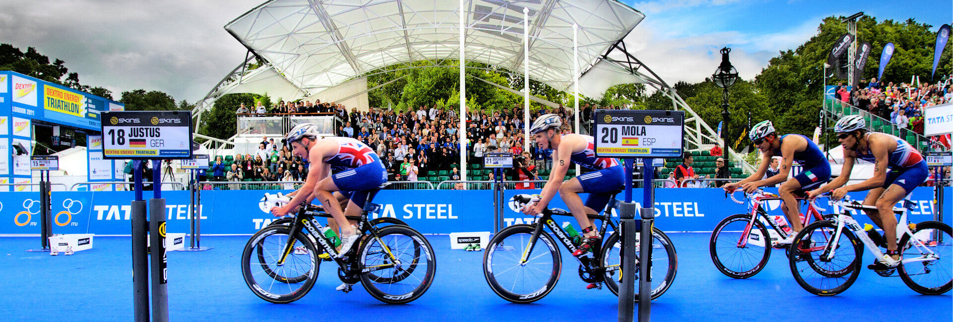 Group of athlete cyclists taking part in the Dextro Energy Triathlon 