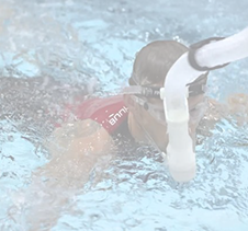 Athlete swimmer using snorkel to aid breathing during race