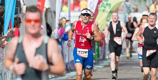 Group of triathlete runners taking part in a marathon