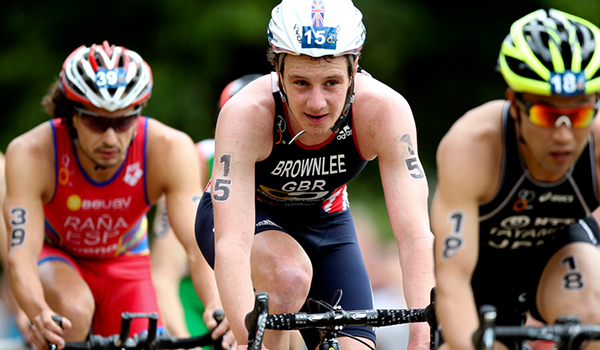 Group of athlete cyclists taking part of a triathlon race