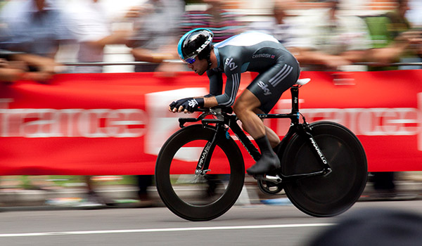 Athlete cyclist taking part in triathlon race