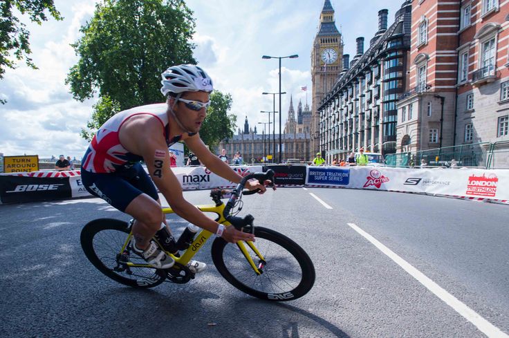 Cyclist taking part in london triathlon race