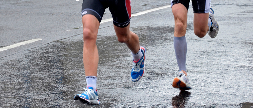 Two runners setting pace during race.